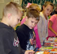Photo of children and books
