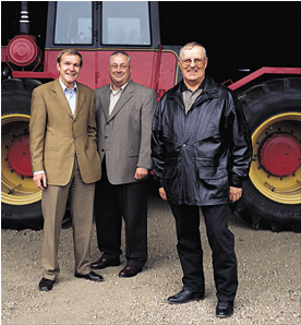 Roger Straathof, RBC Royal Bank, and Peter MacIntyre, RBC Global Services, with Orval Sorken, United Farmers of Alberta Co-operative Limited