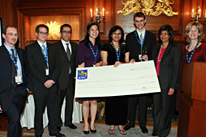 2009/10 winning team, 4th Fibonacci (Schulich School of Business), accept their prize, a cheque for $20,000