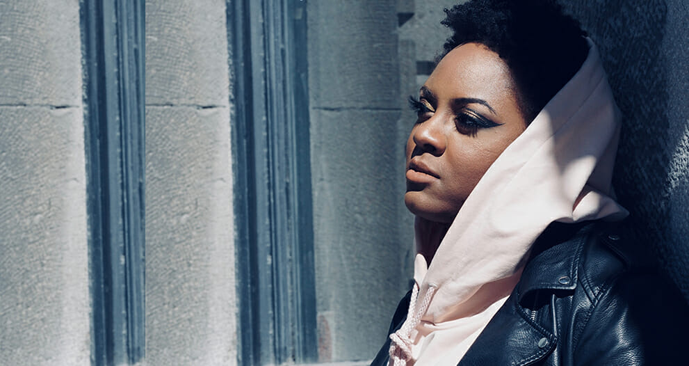 Ketty Cédat profile picture, wearing a leather jacket and hood